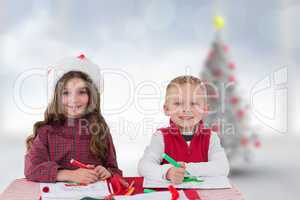 Composite image of cute siblings drawing pictures