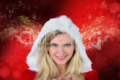 Composite image of pretty girl in santa outfit with hands out