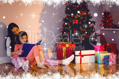 Composite image of mother and daughter waiting for santa claus