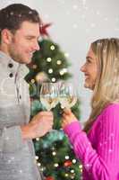 Composite image of happy couple enjoying some wine