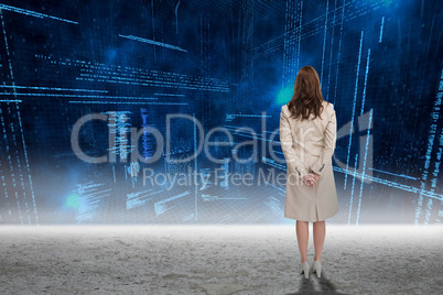 Composite image of rear view of businesswoman