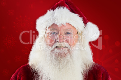 Composite image of santa smiles in the camera