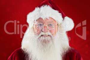 Composite image of santa smiles in the camera