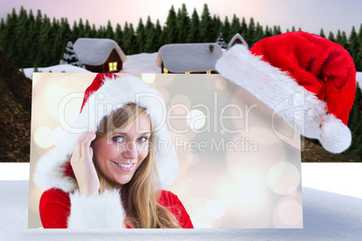 Composite image of festive blonde smiling at camera