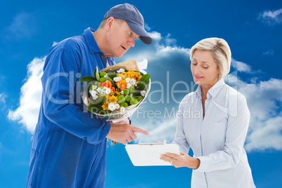 Composite image of happy flower delivery man with customer