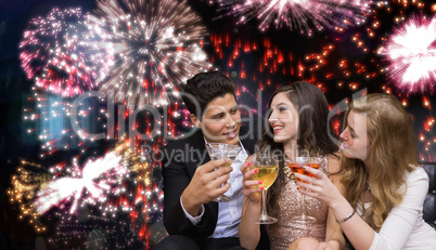 Composite image of friends toasting