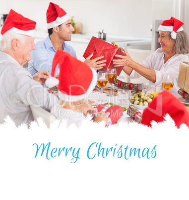 Composite image of happy family exchanging christmas gifts