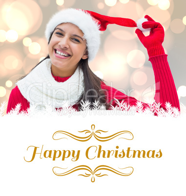 Composite image of festive brunette