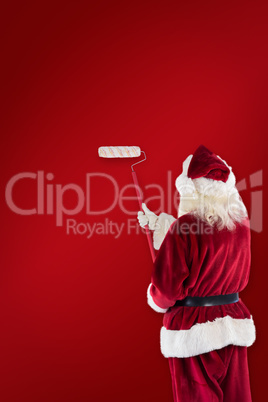 Composite image of santa has a globe in his hand