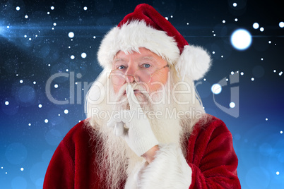 Composite image of santa asking for quiet to camera