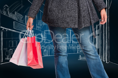 Composite image of smiling woman holding shopping bag