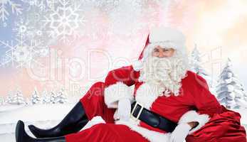 Composite image of relaxed santa sitting and leaning on his sack