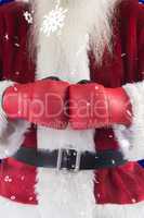 Composite image of santa claus wears boxing gloves