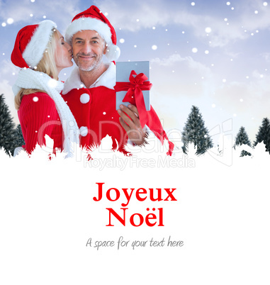 Composite image of festive couple