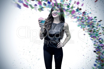 Composite image of brunette with cocktail