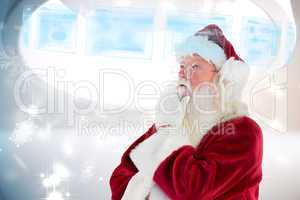 Composite image of santa is thinking about something