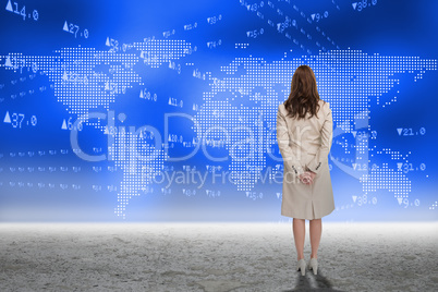 Composite image of rear view of businesswoman