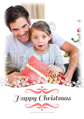 Composite image of portrait of a surprised little girl holding a Composite image of portrait of a surprised little girl holding a