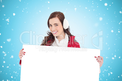 Composite image of beautiful brunette showing white poster