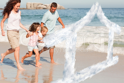 Composite image of family running on the beach