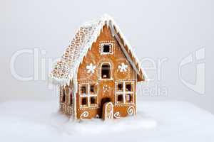 The hand-made eatable gingerbread house and snow decoration