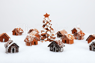 The hand-made eatable gingerbread houses and New Year Tree with