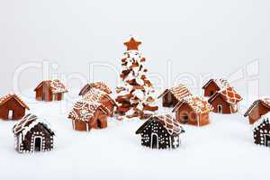 The hand-made eatable gingerbread houses and New Year Tree with