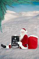 Composite image of santa sits leaned on his bag with a board