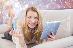 Composite image of blonde shopping online