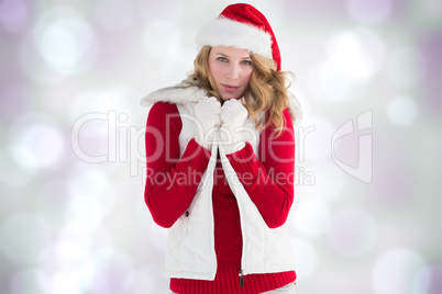 Composite image of cute smiling woman in stylish warm clothing