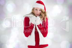 Composite image of cute smiling woman in stylish warm clothing