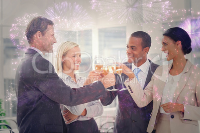 Composite image of business team celebrating with champagne and