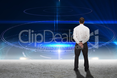 Composite image of businessman turning his back to camera