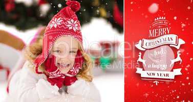 Composite image of festive little girl in hat and scarf
