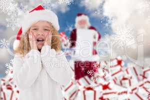 Composite image of festive little girl with hands on face