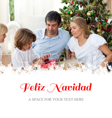 Composite image of cheerful family celebrating christmas
