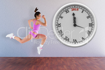 Composite image of fit brunette running