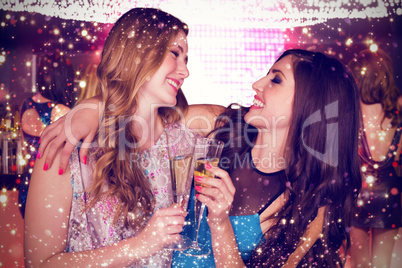 Composite image of friends drinking champagne