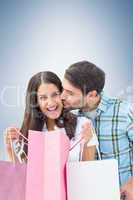 Happy couple with shopping bags