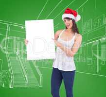 Pretty girl in santa hat holding poster