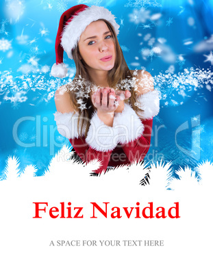 Composite image of sexy santa girl blowing over hands