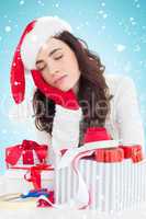 Composite image of brown hair in santa hat napping