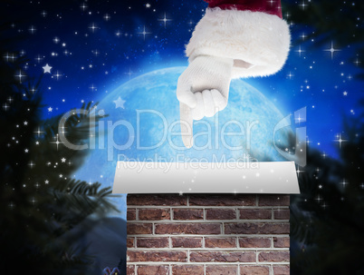 Composite image of santa claus points at something