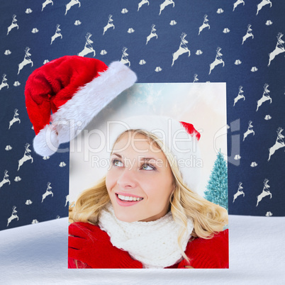 Composite image of happy festive blonde