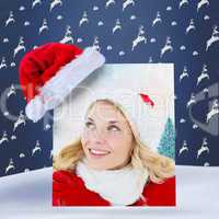 Composite image of happy festive blonde