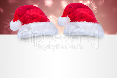 Composite image of santa hat on poster