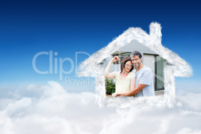 Composite image of happy couple after buying house