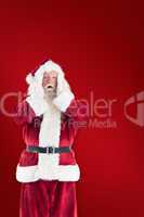 Composite image of santa is shocked to camera