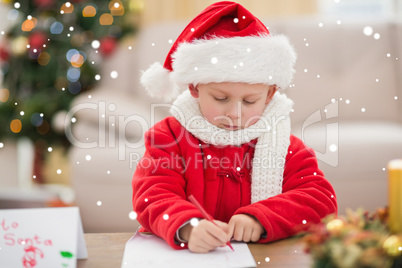 Composite image of festive little boy writing wish list