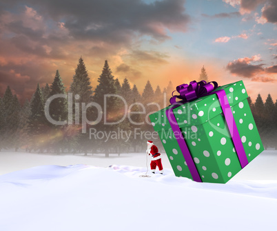 Composite image of santa delivering large gift